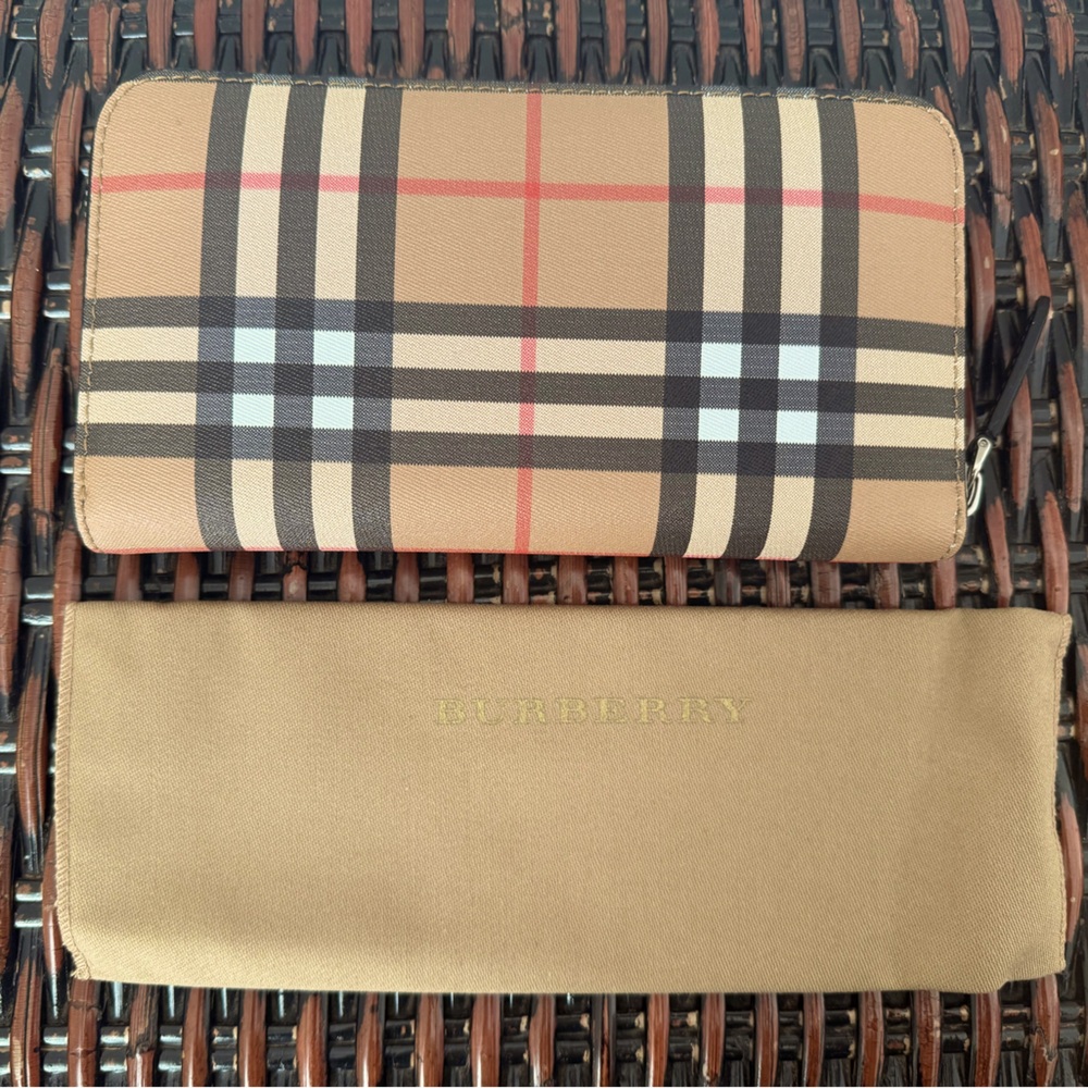 Burberry Vintage large zip around wallet.